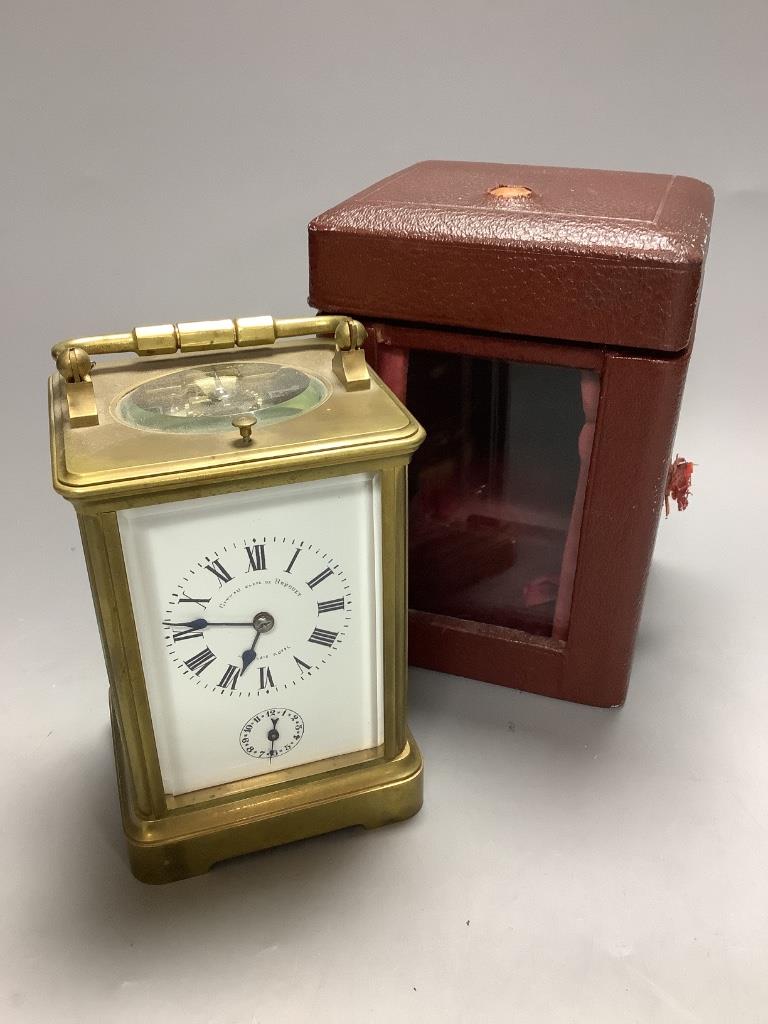 An early 20th century laquered brass repeating carriage clock with alarm, marked apprentice of Breguet, height 12cm